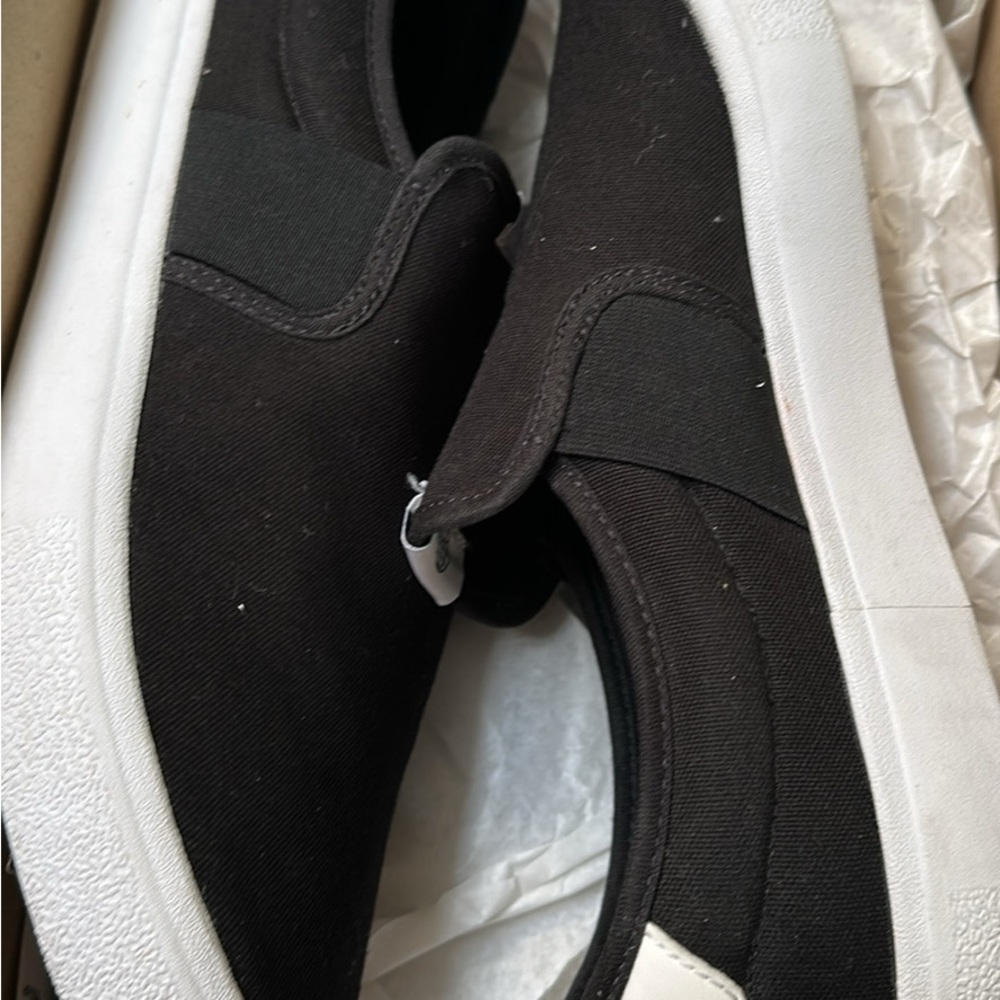 adidas Black and White Slip-On Sneakers